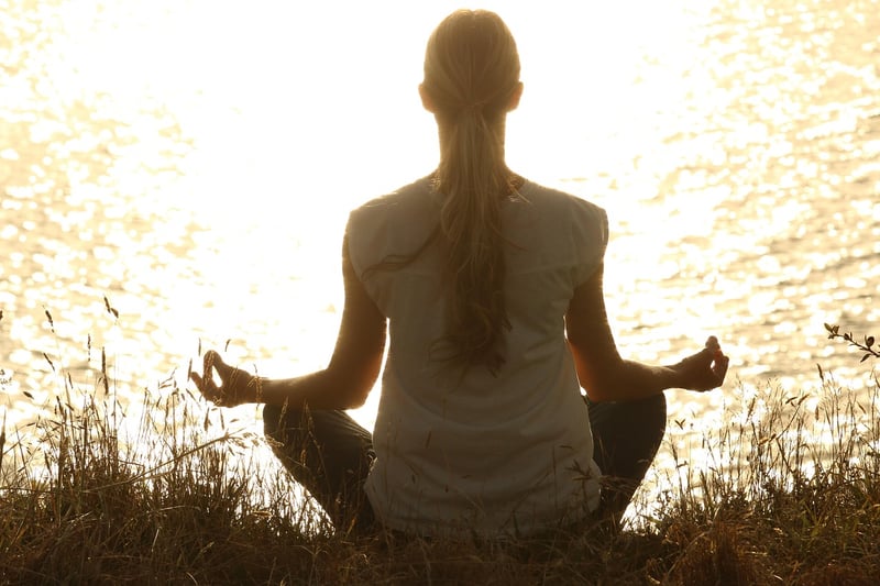 Woman practicing Ashtanga yoga